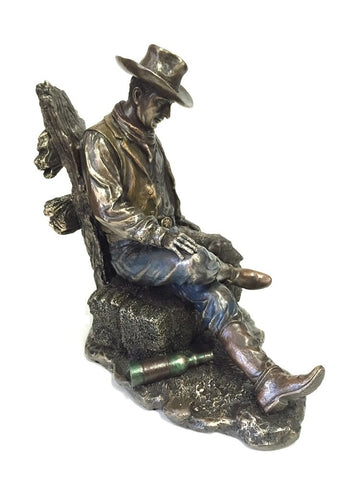Cowboy and Dog Napping Statue Sculpture